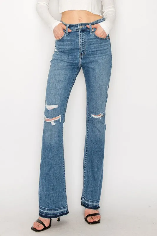 HIGH RISE SKINNY BOOTCUT WITH RELEASE HEM